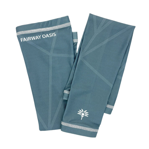Two light blue arm sleeves with 'Fairway Oasis' branding on a white background